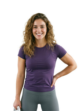 Confident young personal trainer standing tall, smiling directly at viewer.