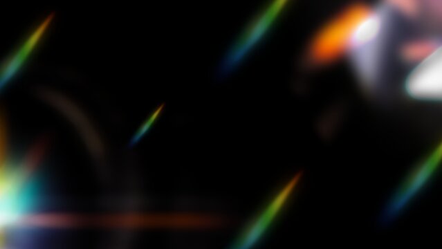 A dark cinematic overlay featuring vibrant crystal prism light leaks, colorful rainbow lens flares, and soft bokeh spots scattered on a black background.