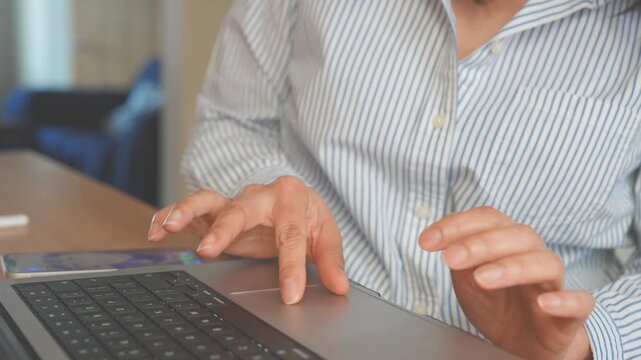 Professional Typing on Laptop for AI Powered Business Workflow, SaaS applications, Digital Collaboration. Modern Workplace Concept featuring Productivity, Cloud Computing, Remote Work, Business Transf