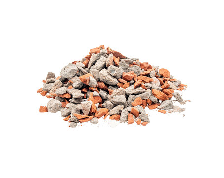 Pile of broken concrete and red brick rubble isolated on white background, showing construction waste, demolition debris and rough texture for building or repair concepts.