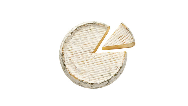 Top view of a creamy round brie cheese wheel with one slice cut out from the textured soft rind surface isolated on a white on transparent background