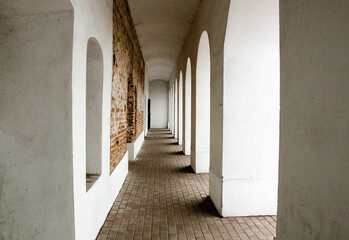 Fototapeta premium Corridor inside stone fortress fortification, heritage landmark Vyborg, Russia
