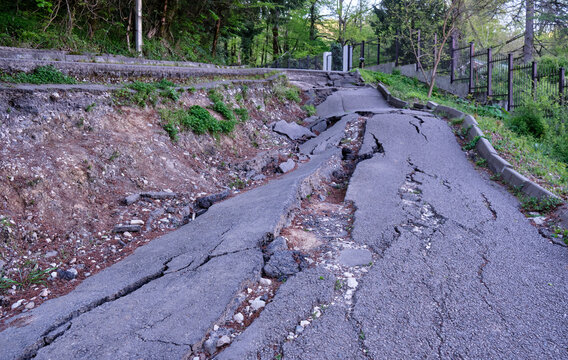 A section of road destroyed by a landslide. Natural disaster.