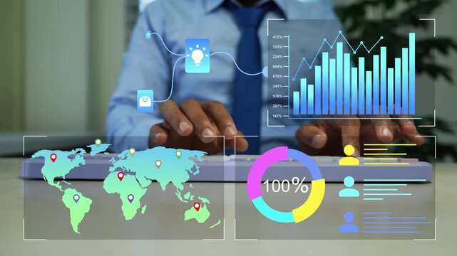 Hologram business analytics dashboard on laptop in office, Business professional using a laptop with holographic digital charts world map and analytics overlay
