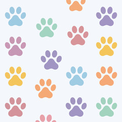 Fototapeta premium A colorful pattern of cute animal paw prints on white background