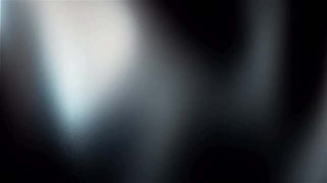 Full screen smooth animated gradient background slowly shifting from deep black and metallic silver to platinum and charcoal with soft flowing motion