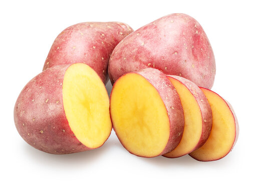 Raw red potatoes with cut into thin slices of potato isolated on a white background. Organic food