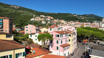 Fototapeta premium Aerial view of Fezzano village along the Ligurian coast with colorful houses and harbor