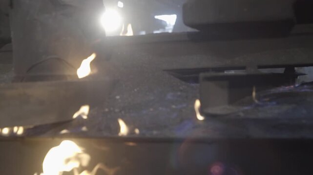 Industrial Metal Casting Process with Molten Metal and Sparks