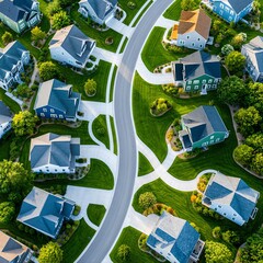 Fototapeta premium View of suburban neighborhood with curved roads and houses in the daytime