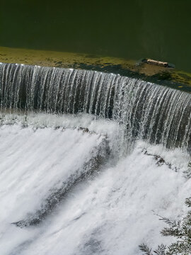 Flow from a river dam serving a textile mill