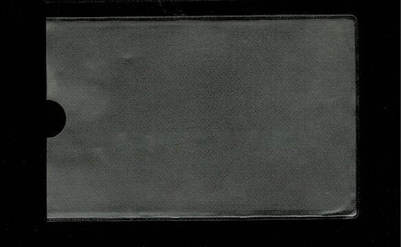 Blank textured plastic card sleeve isolated on black background