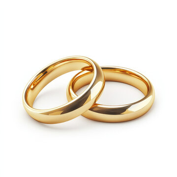 Two gold wedding rings shine in bright light showcasing their smooth bands and simple design near each other on a white surface
