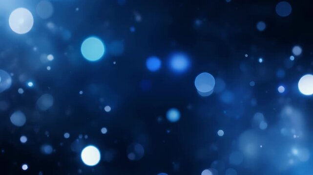 Abstract blue bokeh light background with soft glowing circles
