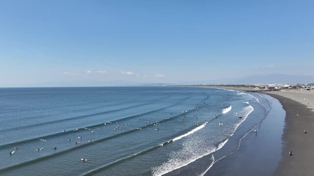 Drone Aerial of Busy Surf Line at Kugenuma Beach