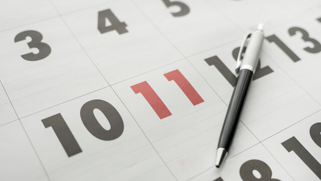 Day 11 on the calendar is marked in red. The 11th is a holiday.