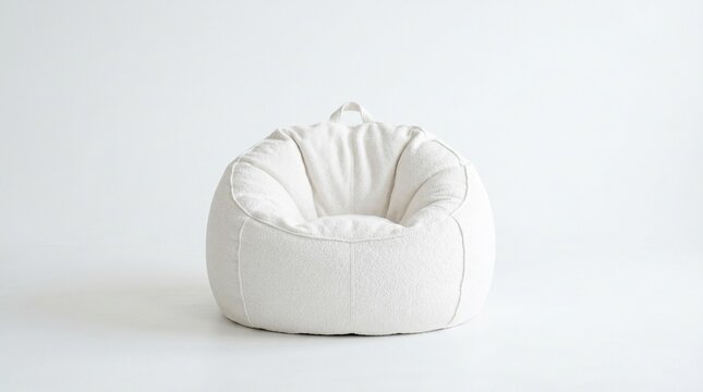Modern white bean bag chair featuring a soft textured fabric surface designed for comfortable lounging in a minimalist interior space captured with bright studio lighting against a clean white backgro