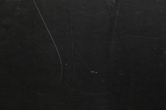 	
grunge overlay effect with scratch and dust on black background,retro noisy grain dust texture for film or photo overlay,grunge distressed texture overlay texture background	

