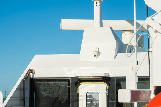 Close Up View of White Marine Superstructure with Dome Radar And CCTV Camera, The Concept of Navigation Technology