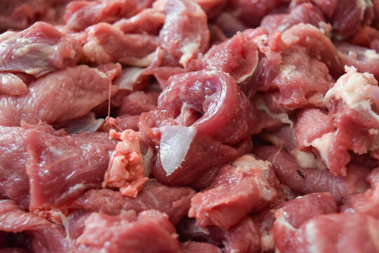 piles of raw and fresh lamb or goat meat obtained during Eid al-Adha in Indonesia.