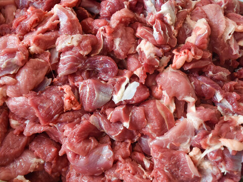 piles of raw and fresh lamb or goat meat obtained during Eid al-Adha in Indonesia.