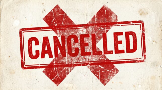 Rubber stamp with Cancelled text and crossed out mark