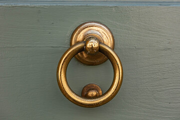 Vintage solid brass door knocker in baroque style with a classic ring handle ideal for entry door...