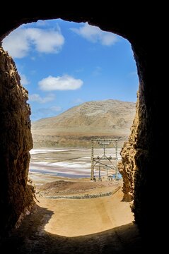 View through rock to salina at sandbeach. Sal. Pedro Da Sal. Cabo Verde. Africa