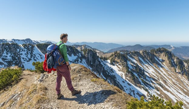 Hiker on ridge, hiking trail to Brecherspitz, Schliersee, Oberbayern, Bavaria, Germany