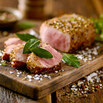 Smoked Pork Loin Sliced on Rustic Wooden Board AI Generative