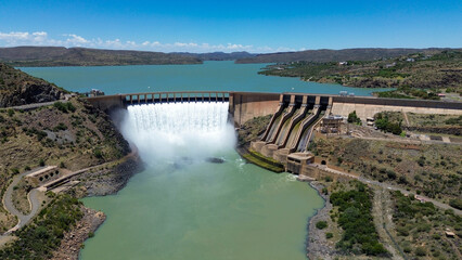 Obraz premium Aerial view of the Vanderkloof Dam and hydroelectric dam is situated approximately 130 km downstream from Gariep Dam and is fed by the Orange River.