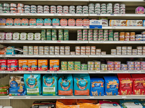 Penticton, Canada - May 27, 2026: Shelves are filled with various brands of canned cat food at a pet store located in London Drugs Penticton, Canada.