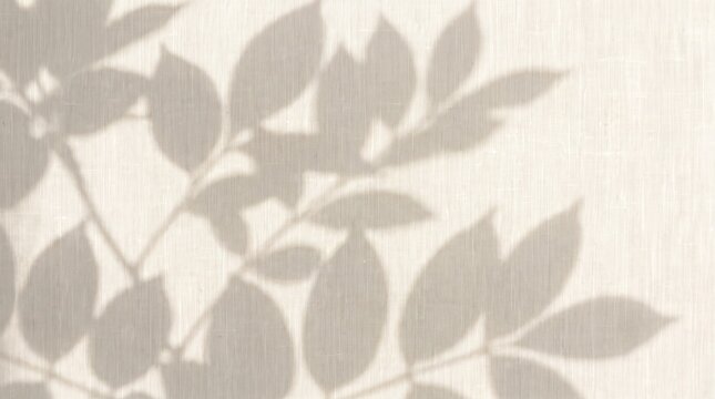 A full frame abstract pattern of flat overlapping transparent leaf silhouettes creating layers of shadow on an ecru woven canvas