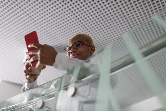 African American businesswoman using smartphone