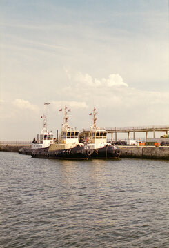 Tugboats At Dock