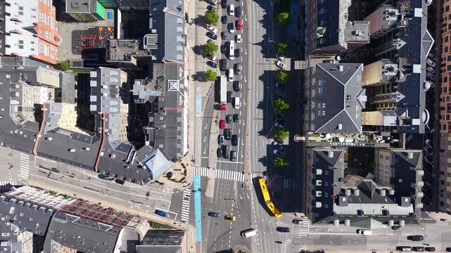 Top-down view of traffic on an intersection and streets in Copenhagen, Denmark