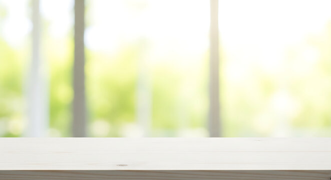 Empty white wooden table surface in front of blurred bright green natural park view with background interior template freshness