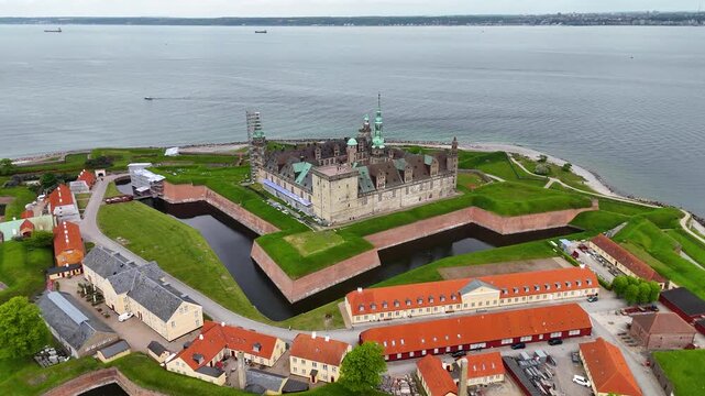 Drone shot of Kronborg Castle over moat and sea, Helsingor, Denmark
