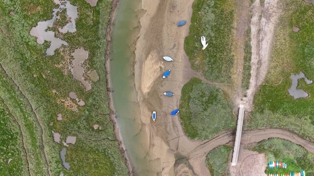 Top-down view of boats in Blakeney National Nature Reserve, United Kingdom
