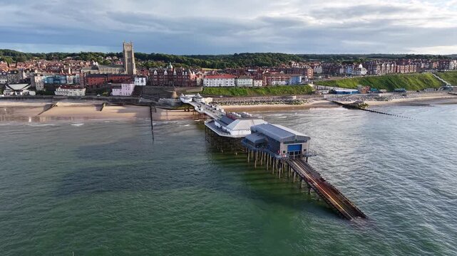 Flight over Cromer coastal town and beach in Norfolk, United Kingdom