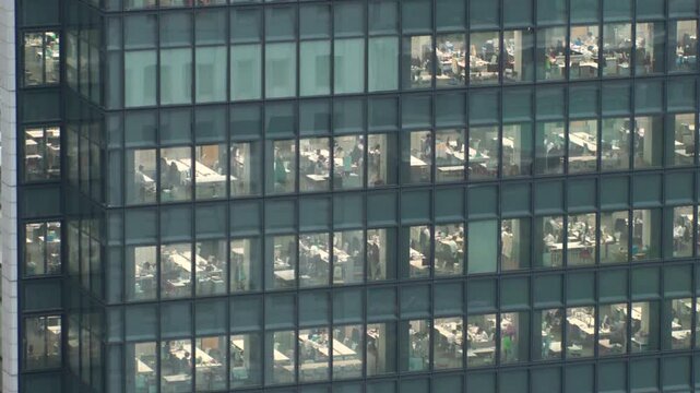 TOKYO, JAPAN : Close up time lapse shot of office building window at night. Job, work, company, corporate and business people concept video.