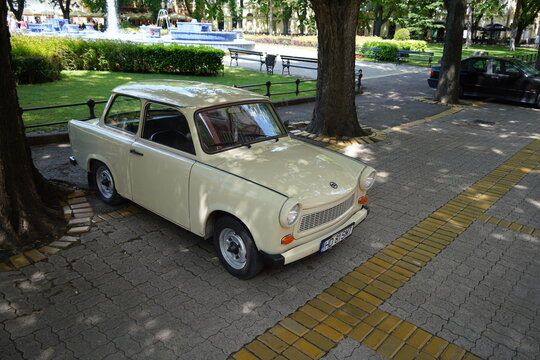 High angle view of a classic beige Trabant 601 S retro car from the communist German Democratic Republic GDR era, parked in a public park in Subotica, Serbia, on June 7, 2026.