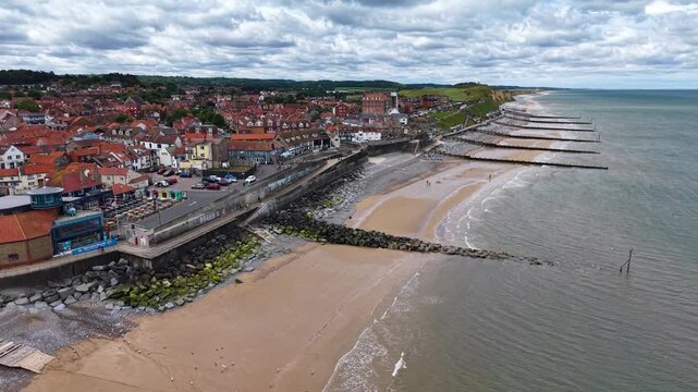 Aerial view of coastline and beach in Sheringham town, Norfolk, United Kingdom