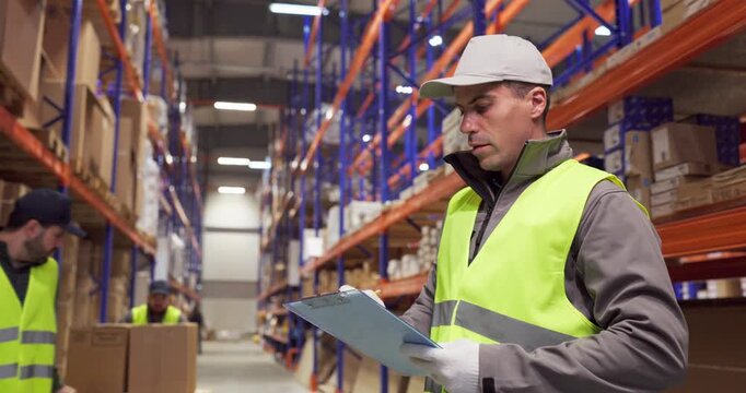 Worker in warehouse checking inventory checklist clipboard. Staff member audits stock on shelves, tracking parcels for precise shipping and delivery. Lean warehouse logistics accuracy concept.