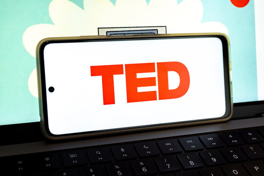 Smartphone showing ted logo on computer keyboard