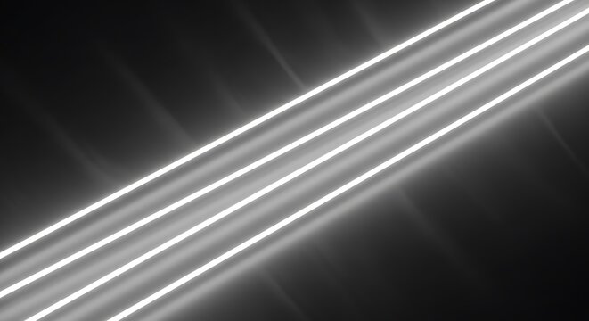 Dynamic bright white light streaks moving diagonally across a deep black background space.