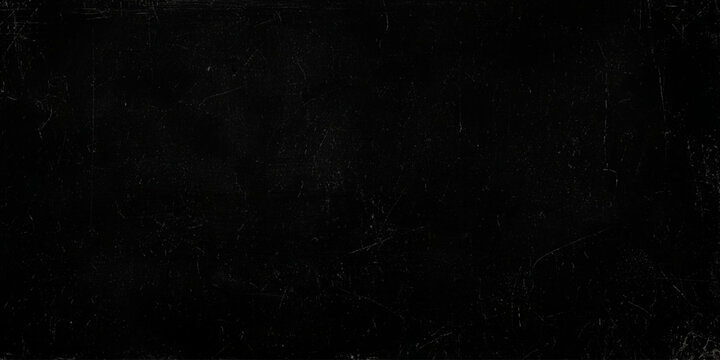 Scratched dark surface with white marks and scuffs on rough textured material