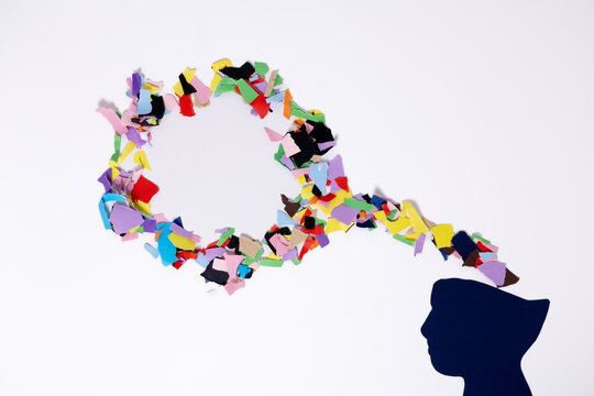 Flow of colorful thoughts connecting two minds in mental health concept