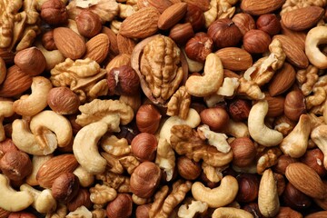 Obraz premium Vegan superfood. Mix of different nuts as background, top view