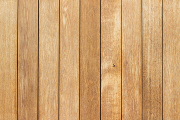 Obraz premium Close-up view of wooden planks arranged in parallel, showcasing natural grain patterns and textures, suitable for backgrounds or design elements in various projects